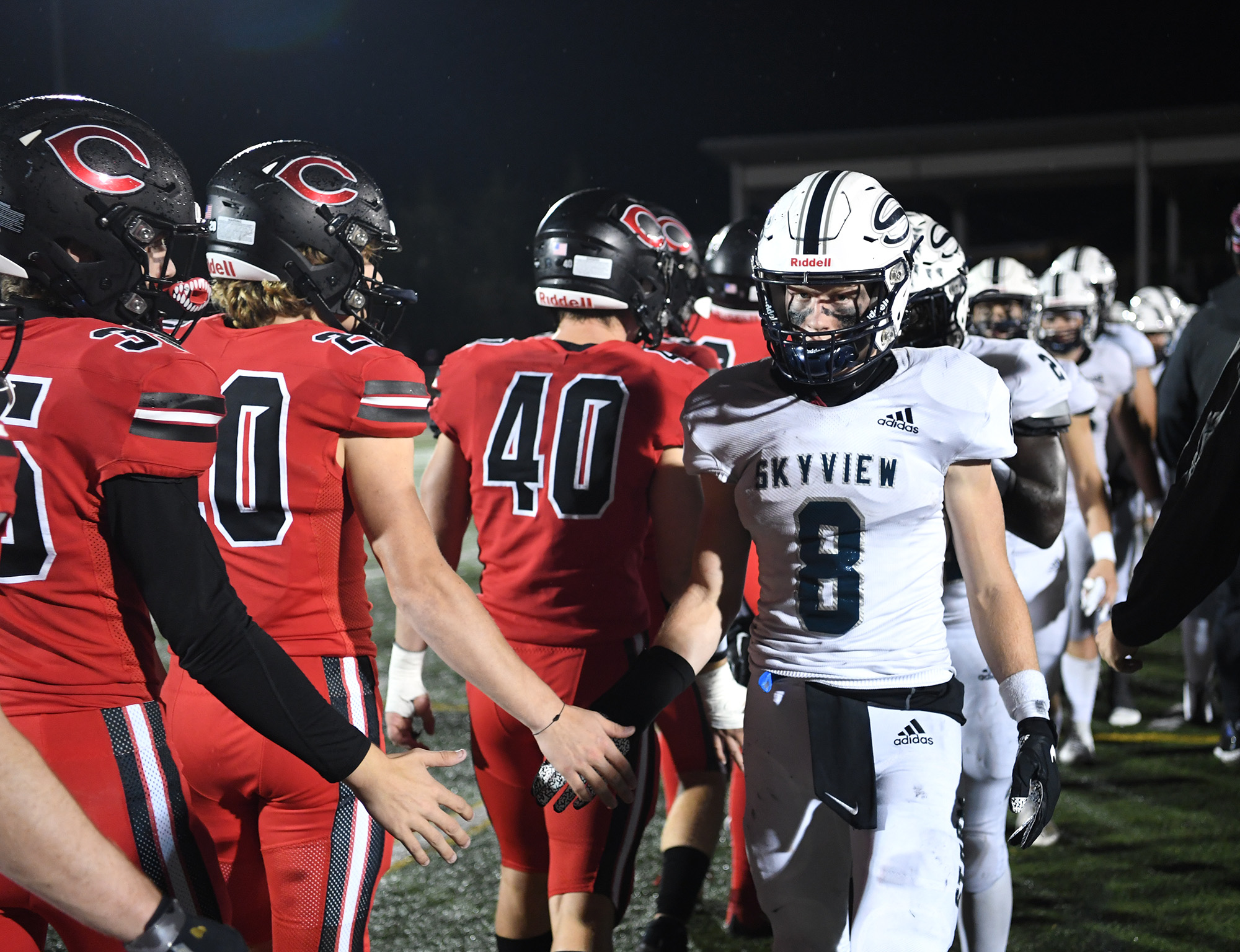 Skyview, right, and Camas players shake hands after the game Friday, Oct. 13, 2023, at Doc Harris Stadium in Camas. Camas won 21-9.