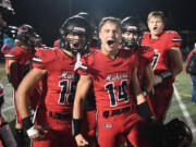 Camas players Alex Hroza, left, and Beau Harlan celebrate after 21-9 win against Skyview on Friday.