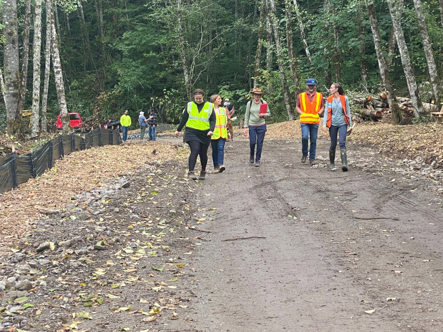 Officials from the Washington Department of Ecology, U.S. Army Corps of Engineers and Clark County visit the Portland Vancouver Junction Railroad's construction project in Chelatchie. The agencies were on site to inspect damage to streams in the area reported by residents.