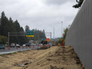 With the cooler temperatures and wetter conditions, work to add a third lane to state Highway 14 is wrapping up for the year and will resume in the spring.