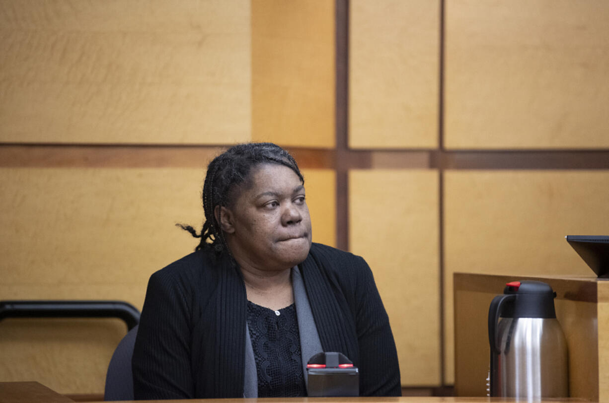 Felicia Adams takes the stand at the Clark County Courthouse on Thursday morning. Adams was the adoptive mother of a 15-year-old Vancouver boy who died in November 2020.