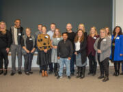 Regional business and community leaders recently honored 21 staff and volunteers as part of the Learn Here Project.