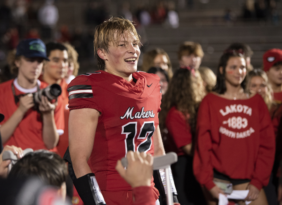 Camas senior Trenton Swanson leads postgame shoutouts Friday, Oct. 13, 2023, after the Papermakers' win against Skyview at Doc Harris Stadium in Camas.