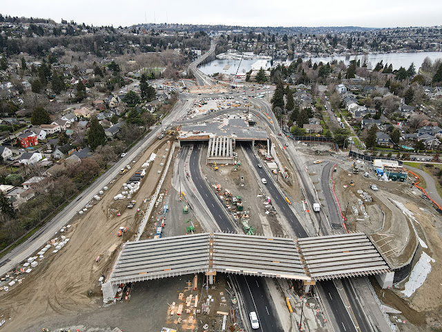 In the foreground are the 30 girders placed over the Feb. 25-26 weekend for a bike/pedestrian bridge across SR 520. Further west are seven girders set in place for bus and carpool ramps to and from a regional transit hub we are building on the three-acre Montlake lid.