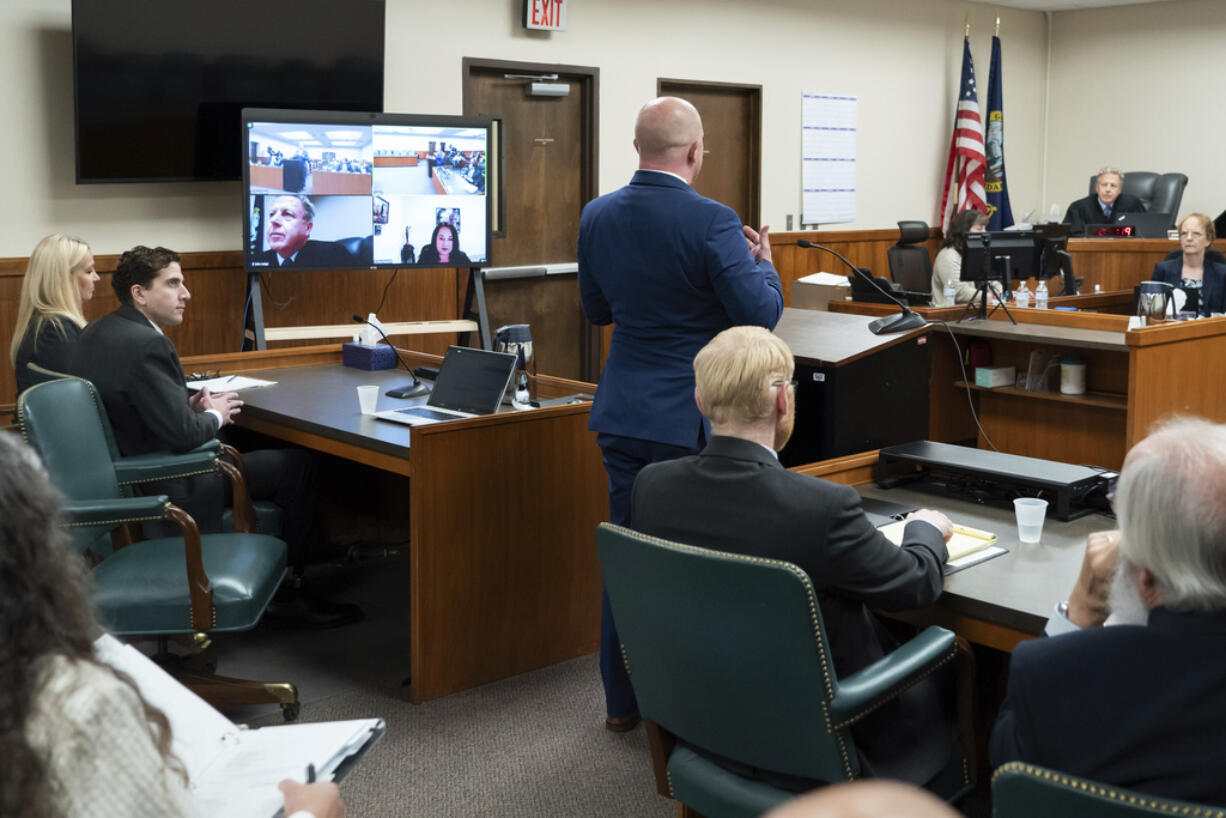 Jay Logsdon, center, an attorney representing Bryan Kohberger, second from left, speaks during a hearing in Latah County District Court, Wednesday, Sept. 13, 2023, in Moscow, Idaho. Kohberger is accused of killing four University of Idaho students in November 2022. (AP Photo/Ted S.