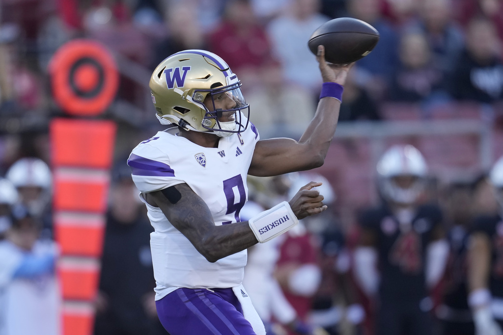 Washington quarterback Michael Penix Jr. passes against Stanford during the first half of an NCAA college football game in Stanford, Calif., Saturday, Oct. 28, 2023.