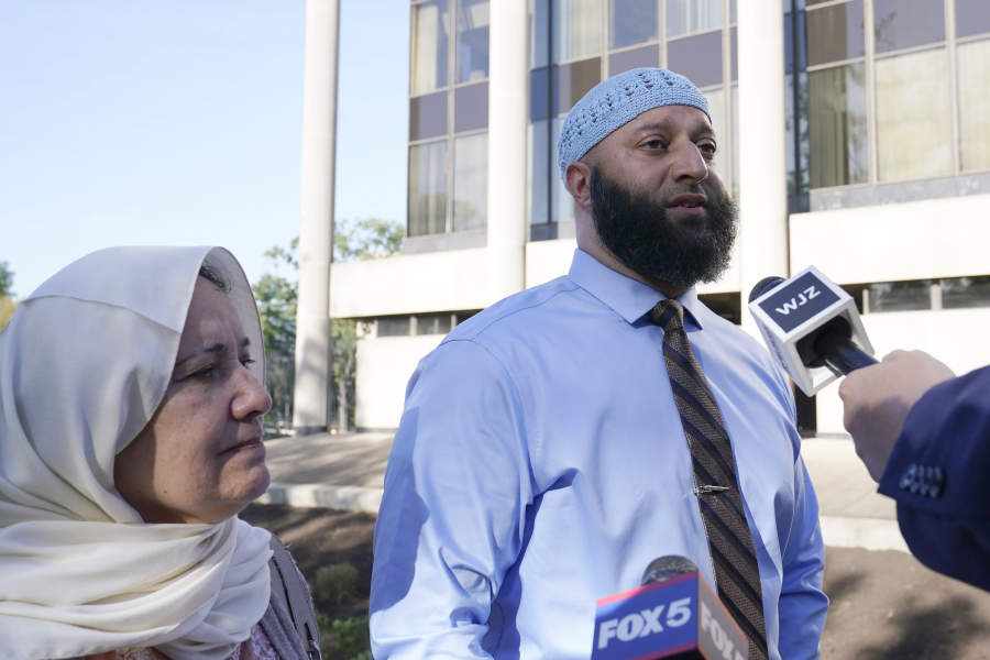 Adnan Syed and his mother Shamim Rahman talk with reporters as they arrive at Maryland's Supreme Court in Annapolis, Md., Thursday, Oct.