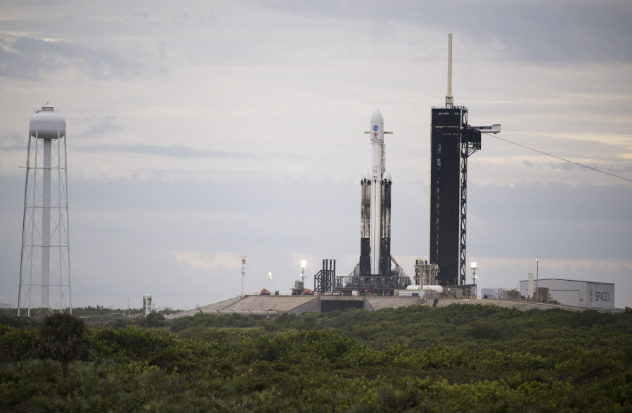 A SpaceX Falcon Heavy rocket with the Psyche spacecraft onboard is seen at Launch Complex 39A as preparations continue for the Psyche mission, Wednesday, Oct. 11, 2023, at NASA's Kennedy Space Center in Florida. NASA's Psyche spacecraft will travel to a metal-rich asteroid by the same name orbiting the Sun between Mars and Jupiter to study it's composition.