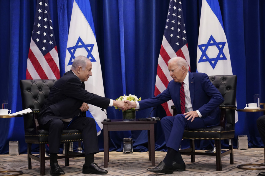 FILE - President Joe Biden meets with Israeli Prime Minister Benjamin Netanyahu in New York, Sept. 20, 2023. Less than three weeks ago, Netanyahu sat beside Biden and marveled that an "historic peace between Israel and Saudi Arabia" seemed within reach. Now, the outbreak of war between Israel and the Palestinians is threatening to delay or derail a country-by-country diplomatic push by the United States to improve relations between Israel and its Arab neighbors.