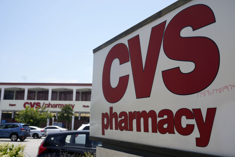 FILE - A sign marks a CVS branch on Tuesday, May 16, 2023, in Pasadena, Calif.  CVS Health is pulling from its drugstore shelves, Friday, Oct. 20,  some cough-and-cold treatments that contain an ingredient that has been deemed ineffective by doctors and researchers.