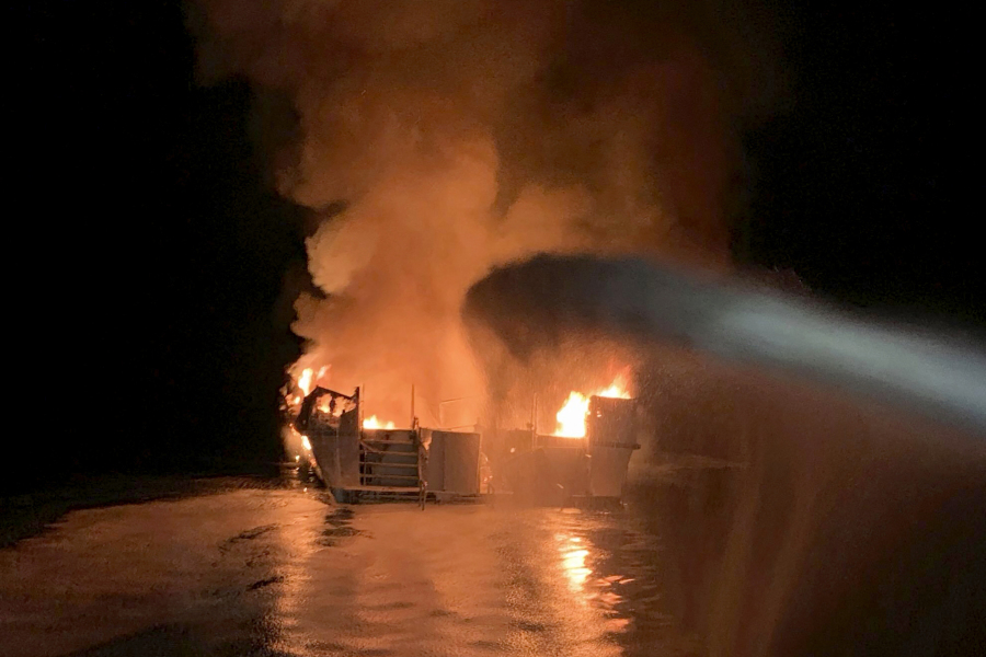FILE - In this photo provided by the Ventura County Fire Department, VCFD firefighters respond to a fire aboard the Conception dive boat fire in the Santa Barbara Channel off the coast of Southern California on Sept. 2, 2019. Federal prosecutors are seeking justice for 34 people killed in a fire aboard the Conception in 2019. The trial against Captain Jerry Boylan begins Tuesday, Oct. 24, 2023, in Los Angeles with jury selection.