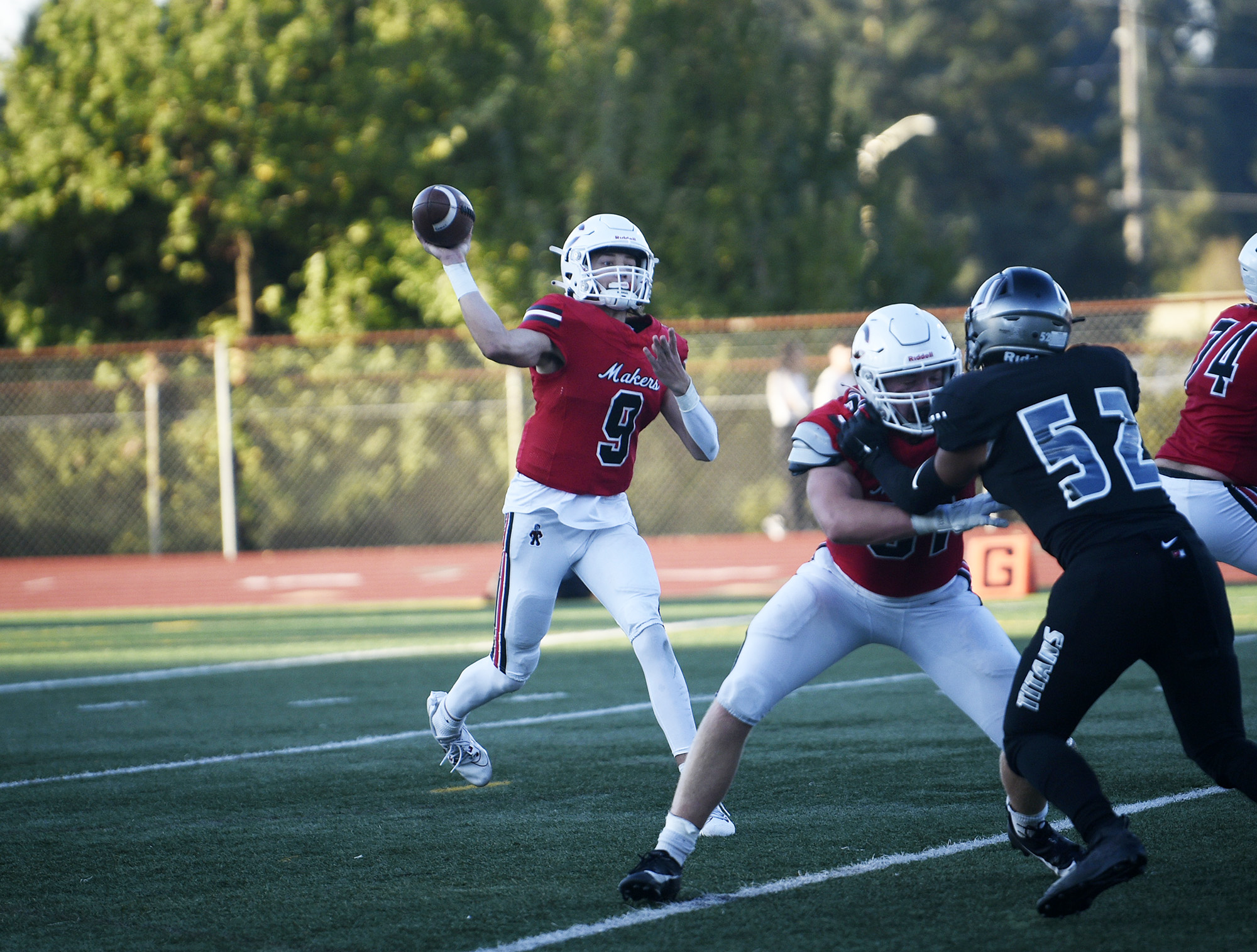 Camas quarterback Jake Davidson delivers a pass in the Papermakers’ 52-27 win over Union at McKenzie Stadium on Friday, Oct. 20, 2023.
