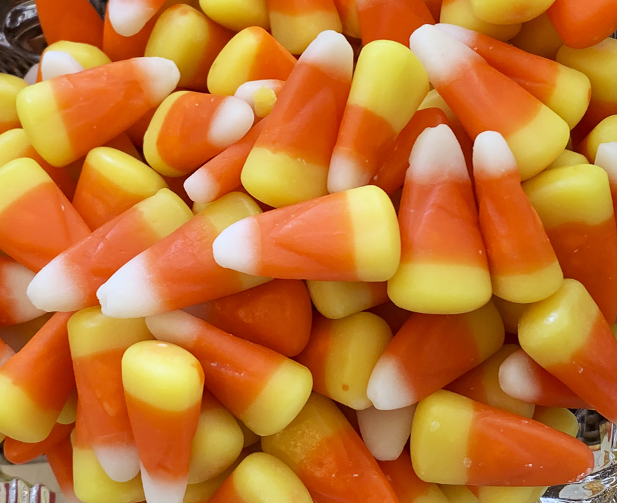 This image shows a pile of candy corn in Westchester County, N.Y. on Oct. 23, 2023. Cruel joke for trick-or-treaters or coveted seasonal delight? The great Halloween debate over candy corn is on.