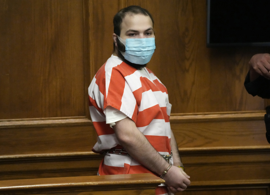 Ahmad Al Aliwi Alissa, accused of killing 10 people at a Boulder, Colo., supermarket, is led into a courtroom for a hearing on Sept. 7, 2021.