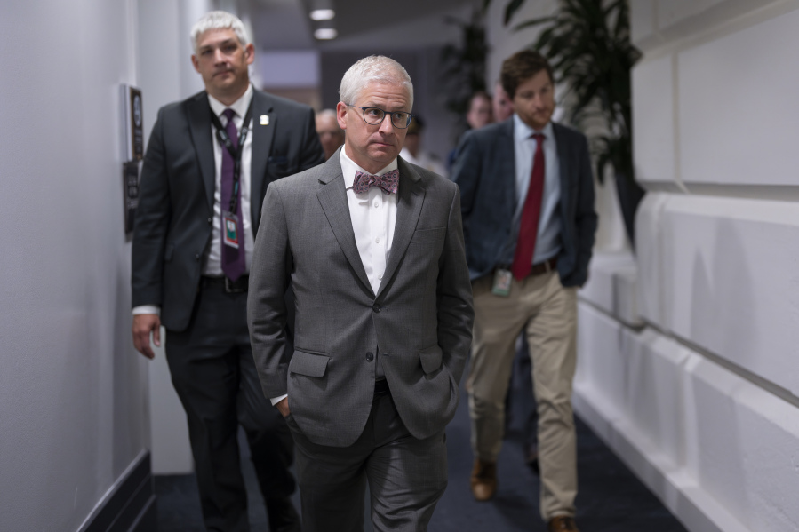 Rep. Patrick McHenry, R-N.C., chairman of the House Financial Services Committee, walks to a meeting of the House Republican Conference after former House Speaker Kevin McCarthy was voted out of the job by a contingent of hard-right conservatives in an extraordinary showdown, a first in U.S. history, at the Capitol in Washington, Tuesday, Oct. 3, 2023. McHenry was named the new temporary leader of the House of Representatives, the speaker pro tempore, and will serve in the office until a new speaker is chosen. (AP Photo/J.
