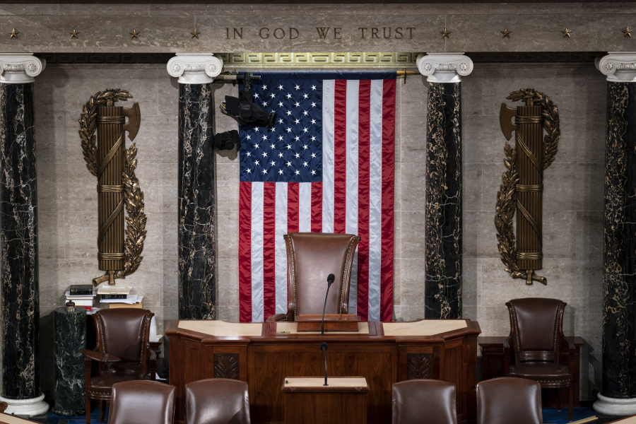 FILE - The speaker's dais is seen in the House of Representatives of the Capitol in Washington, Feb. 28, 2022. After House Speaker Kevin McCarthy was voted out of the job by a contingent of hard-right conservatives this week, House GOP leaders are now grappling to find a new speaker. With no speaker of the House, a constitutional officer second in line to the presidency, the Congress cannot fully function -- to pass laws, fund the government and otherwise serve as the branch of government closest to the people -- during a time of simmering uncertainty at home and abroad. (AP Photo/J.