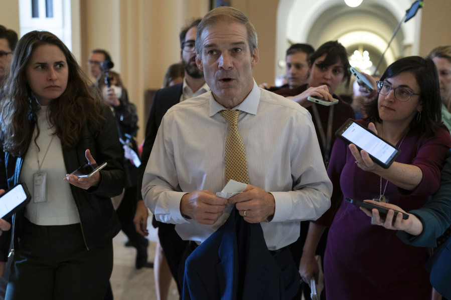 Rep. Jim Jordan, R-Ohio, chairman of the House Judiciary Committee followed by reporters walks to his office after a Republican caucus meeting at the Capitol in Washington, Tuesday, Oct. 17, 2023.