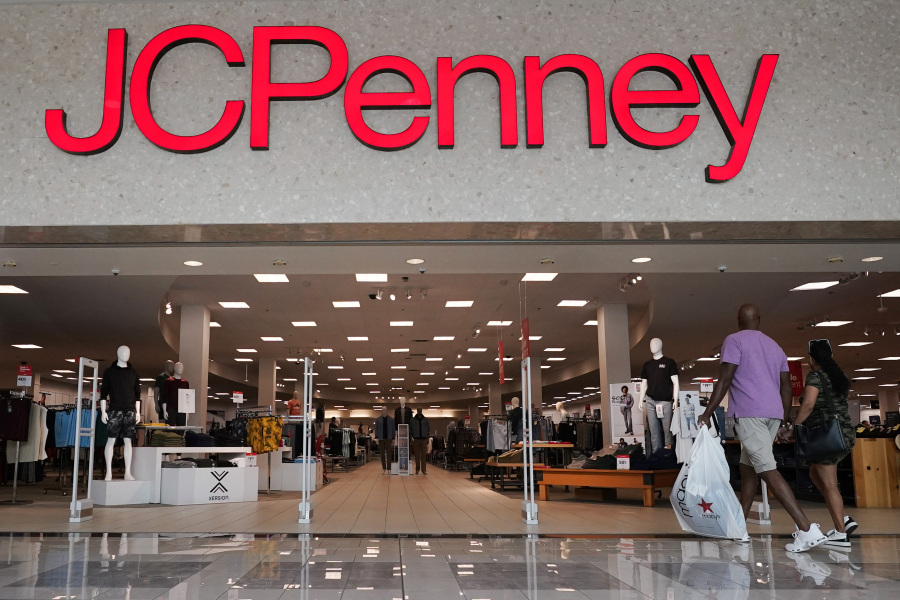 File - A couple approaches a JCPenney store in Frisco, Texas, on Aug. 30, 2023. A surge in U.S. consumer spending is fueling economic growth, reflecting a resilience among households that has confounded economists, Federal Reserve officials and even the sentiments that Americans themselves have expressed in surveys.