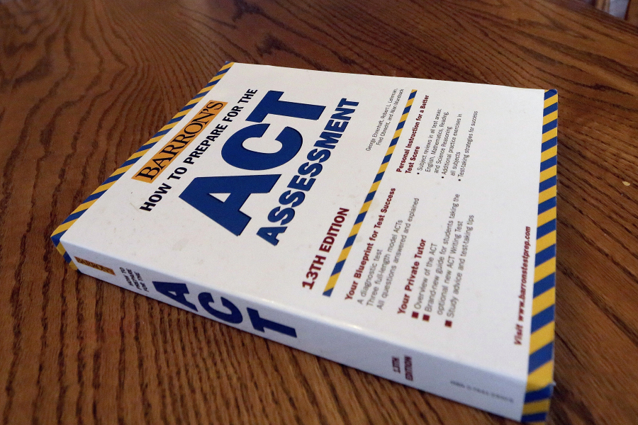 FILE - An ACT Assessment preparation book is seen, April 1, 2014, in Springfield, Ill. High school students' scores on the ACT college admissions test for 2023 dropped to their lowest in more than three decades, showing a lack of student preparedness for college-level coursework, the nonprofit organization that administers the test said Wednesday, Oct. 11, 2023.