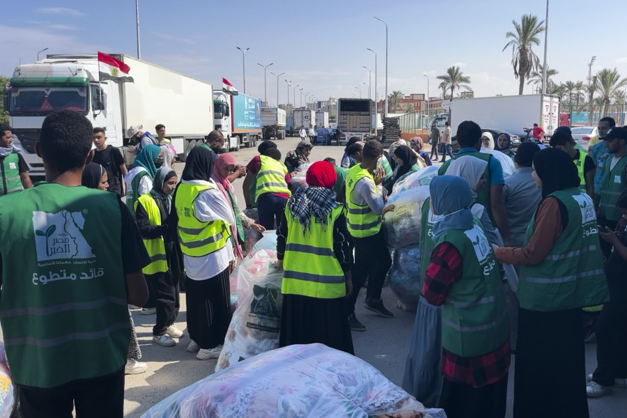 Humanitarian aid convoy for the Gaza Strip is parked in Arish, Egypt, Monday, Oct. 16, 2023. Hundreds of Palestinians in the Gaza Strip have fled their homes ahead of an expected Israeli ground invasion aimed at destroying Hamas after its fighters rampaged through southern Israel.