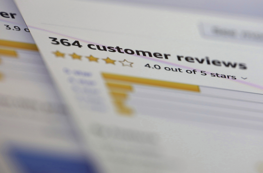 FILE - In this April 17, 2019, file photo, online customer reviews for a product are displayed on a computer in New York. Some of the most used platforms for travel and online shopping said Tuesday, Oct. 17. 2023 they're going to team up to battle fake reviews.