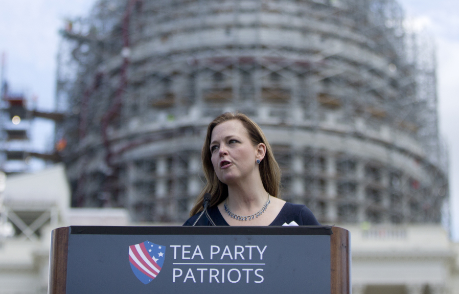FILE - Jenny Beth Martin, president and co-founder of the Tea Party Patriots speaks during a rally organized by Tea Party Patriots on Capitol Hill in Washington, Sept. 9, 2015. Dysfunction within the Republican Party isn't limited to the leadership chaos in the House of Representatives playing out in the nation's capital. The hard-right forces that increasingly steer the direction of the GOP also have gained strength in numerous state legislatures, making it virtually impossible for the party to effectively governor even in states where it has the majority.
