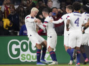 United States midfielder Gio Reyna, left, celebrates a goal with teammates during the first half of an international friendly soccer match against Ghana, Tuesday, Oct. 17, 2023, in Nashville, Tenn.