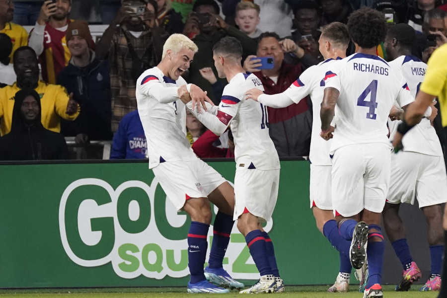 United States midfielder Gio Reyna, left, celebrates a goal with teammates during the first half of an international friendly soccer match against Ghana, Tuesday, Oct. 17, 2023, in Nashville, Tenn.