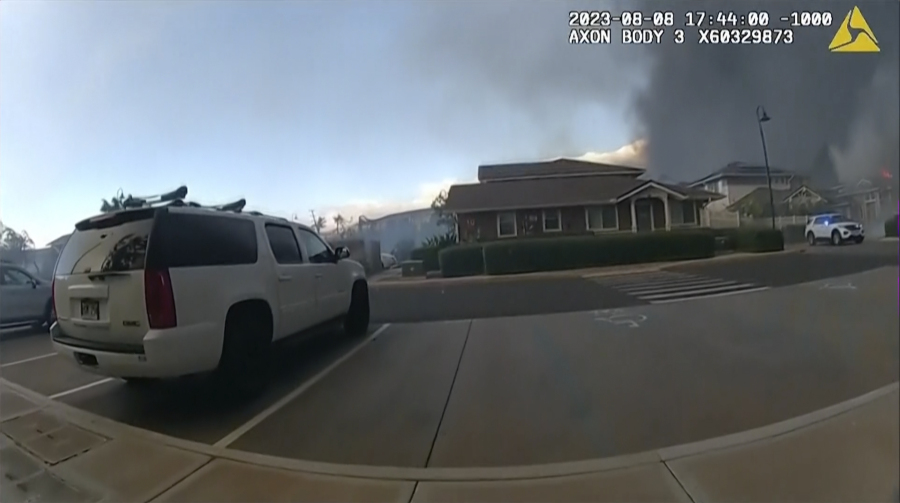 This image provided by Maui Police Department shows police body camera footage taken the day a wildfire tore through Lahaina town on Aug. 8, 2023. Maui police held a news conference on Monday, Oct. 30, 2023 to show 16 minutes of body camera footage taken the day a wildfire tore through Lahaina town.