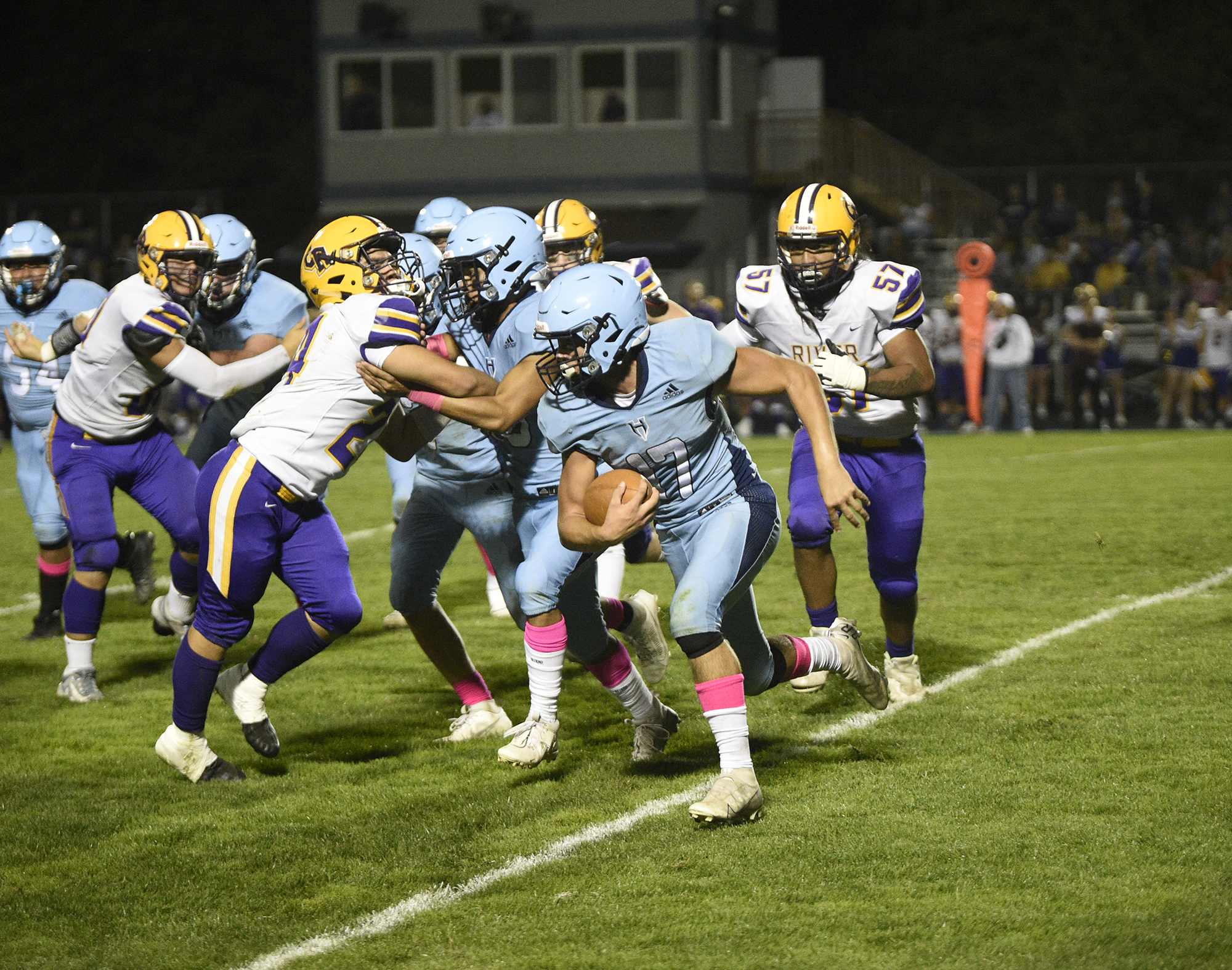 Hockinson’s Andon Stenersen (17) runs for yardage during the Hawks’ 28-7 win over Columbia River at Hockinson High School on Friday, Oct. 6, 2023.