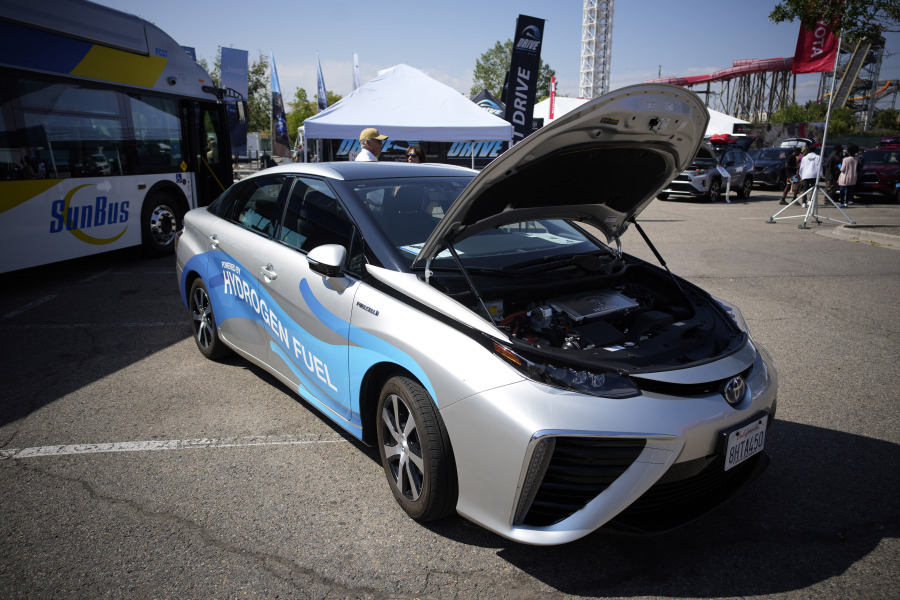 FILE - A 2021 Toyota Prius that runs on a hydrogen fuel cell sits on display at the Denver auto show on Sept. 17, 2021, at Elitch's Gardens in downtown Denver. The White House has selected the Philadelphia area and West Virginia for two regional hubs to produce and deliver hydrogen fuel, an important part of the Biden administration's clean energy plan, according to a person familiar with the plan.