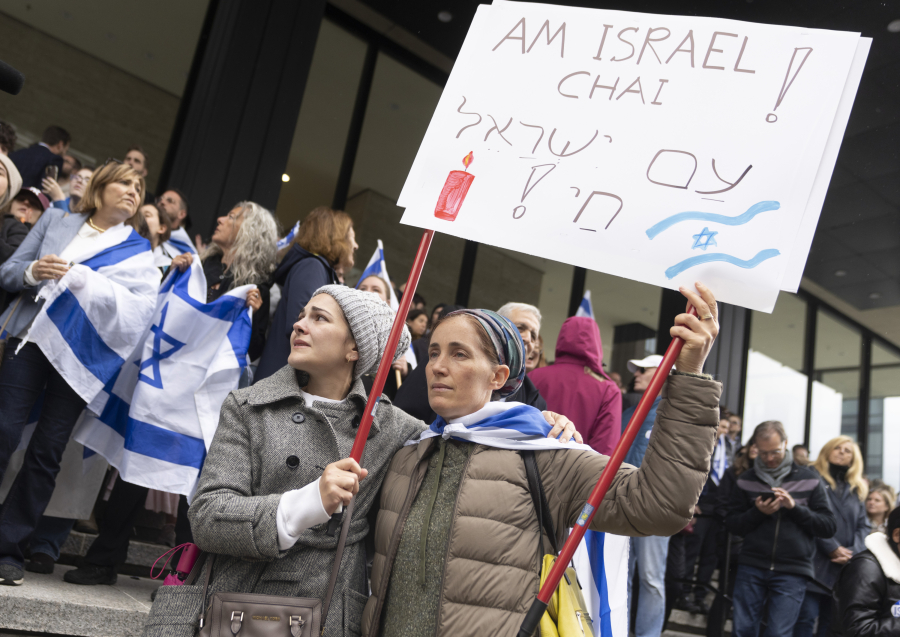 Talia Ben Sasson, right, and Ayellet Tzur attend a rally in support of Israel in Montreal, Tuesday, Oct. 10, 2023.