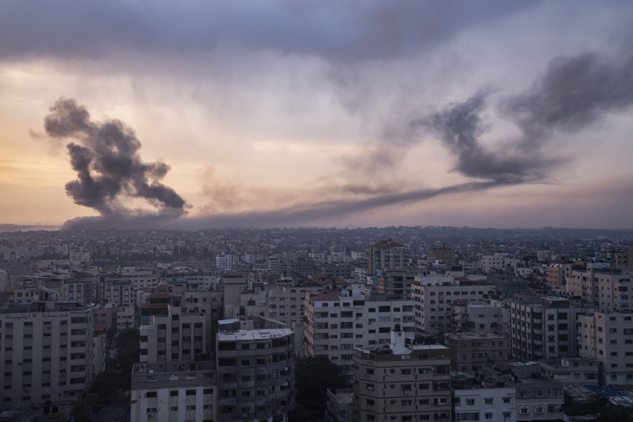 Smoke rises after the Israeli air strike in the Gaza Strip on Monday, Oct. 9, 2023. Israel's military battled to drive Hamas fighters out of southern towns and seal its borders Monday as it pounded the Gaza Strip.