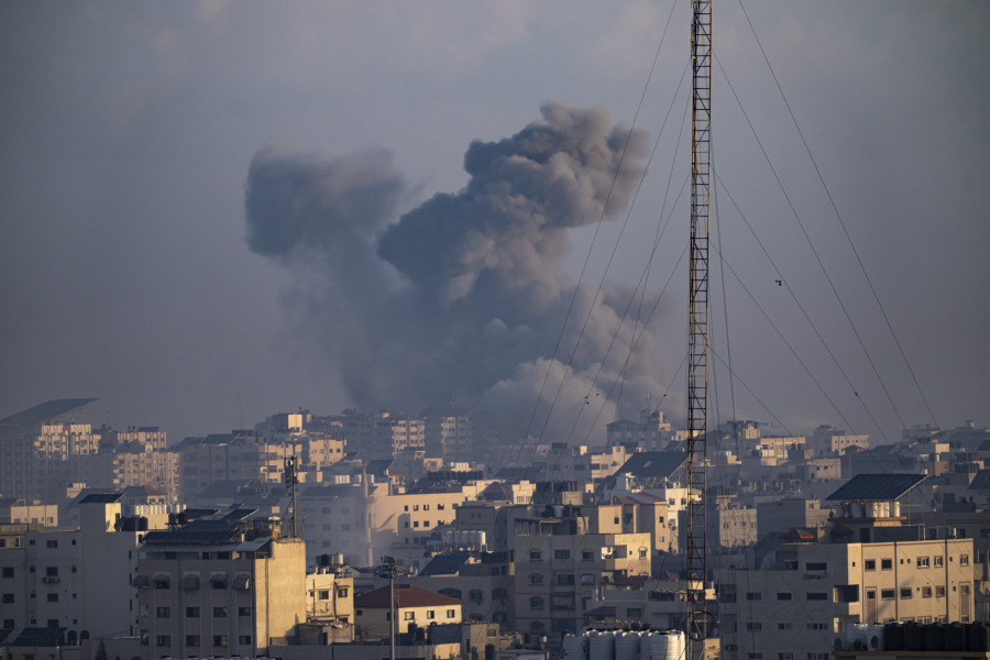 Smoke rises following an Israeli airstrike in Gaza City, Thursday, Oct. 12, 2023. Israel's retaliation has escalated after Gaza's militant Hamas rulers launched an unprecedented attack on Israel Saturday, killing over 1,200 Israelis and taking captive dozens. Heavy Israeli airstrikes on the enclave has killed over 1,200 Palestinians.