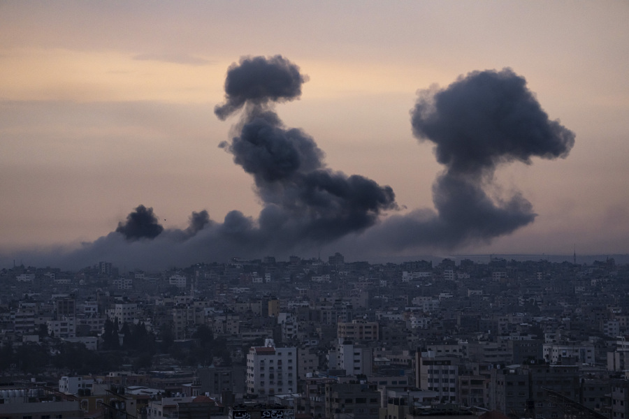 Smoke rises after the Israeli air strike in the Gaza Strip on Monday, Oct. 9, 2023. Israel's military battled to drive Hamas fighters out of southern towns and seal its borders Monday as it pounded the Gaza Strip.
