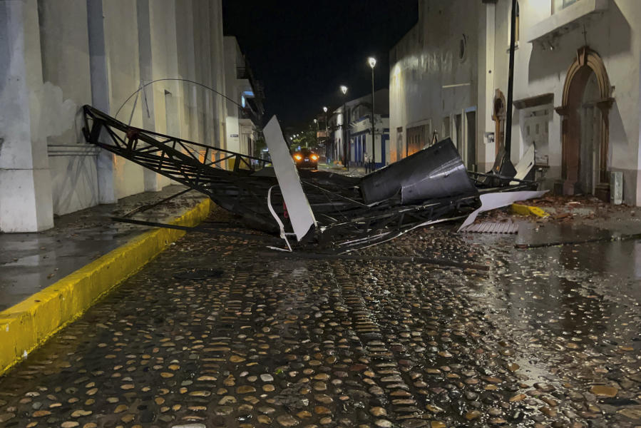 A communications antenna lays on the street after Hurricane Lidia hit, in Puerto Vallarta, Mexico, Wednesday, Oct. 11, 2023. Lidia dissipated Wednesday after hitting land as a Category 4 hurricane.