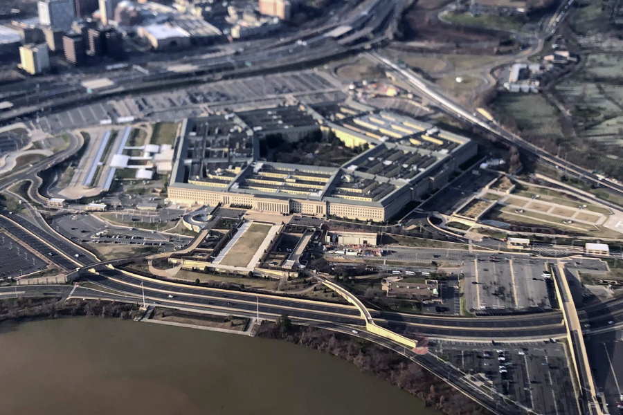 FILE - The Pentagon is seen in this aerial view made through an airplane window in Washington, Jan. 26, 2020. U.S. officials say the number of suicides in the U.S. military and their families dipped slightly in 2022, compared with the previous year.