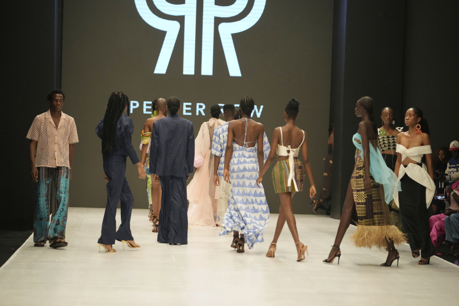 Models wear a creation by Pepper Row during the Lagos Fashion Week in Lagos, Nigeria, Thursday, Oct. 26, 2023. Africa's fashion industry is rapidly growing to meet local and international demands but a lack of adequate investment still limits its full potential, UNESCO said Thursday in its new report released at this year's Lagos Fashion Week show.