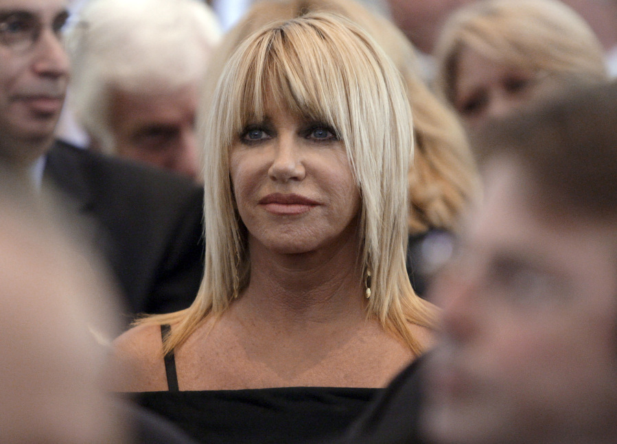 FILE - Suzanne Somers is seen during the funeral services for Merv Griffin at the Church of the Good Shepherd in Beverly Hills, Calif., Aug. 17, 2007. Somers, the effervescent blonde actor known for playing Chrissy Snow on the television show "Three's Company," as well as her business endeavors, died early Sunday, Oct. 15, 2023, her family said in a statement provided by her longtime publicist R. Couri Hay. She was 76.