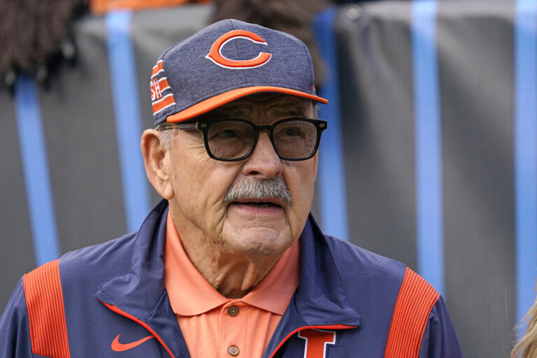 FILE - Chicago Bears great Dick Butkus watches from the sideline during the first half of the team's NFL football game against the Houston Texans on Sept. 25, 2022, in Chicago. Butkus, a fearsome middle linebacker for the Bears, has died, the team announced Thursday, Oct. 5, 2023. He was 80. According to a statement released by the team, Butkus' family confirmed that he died in his sleep overnight at his home in Malibu, Calif. (AP Photo/Nam Y.