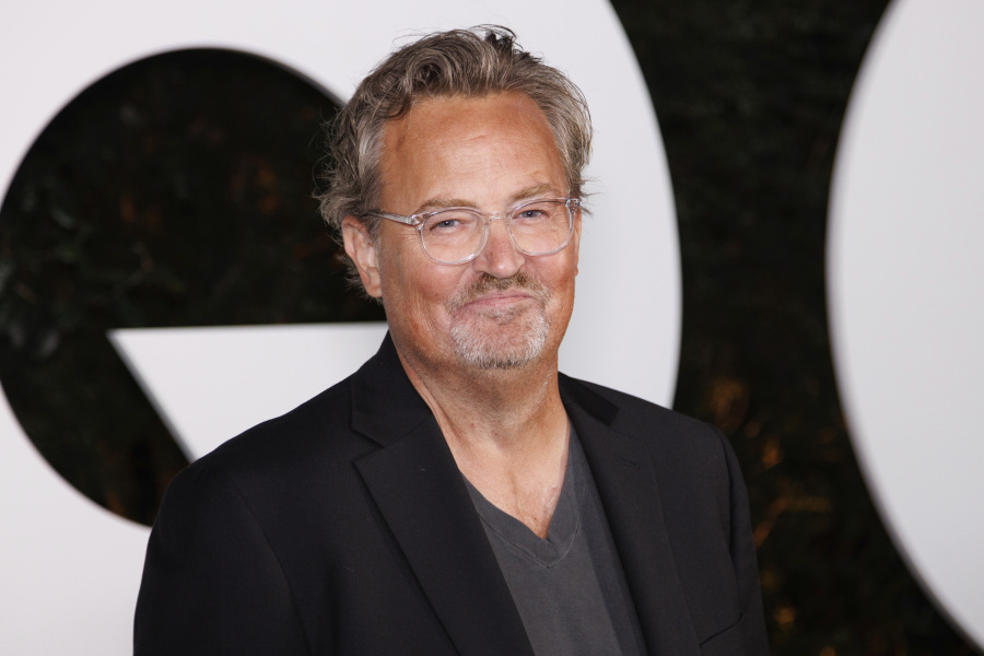 FILE - Matthew Perry arrives at the GQ Men of the Year Party on Thursday, Nov.17, 2022, in West Hollywood, Calif. Perry, who starred as Chandler Bing in the hit series "Friends," has died. He was 54. The Emmy-nominated actor was found dead of an apparent drowning at his Los Angeles home on Saturday, according to the Los Angeles Times and celebrity website TMZ, which was the first to report the news. Both outlets cited unnamed sources confirming Perry's death. His publicists and other representatives did not immediately return messages seeking comment.