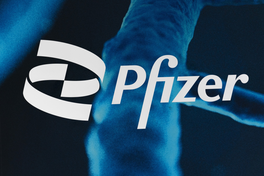 FILE - The Pfizer logo is displayed at the company's headquarters, Friday, Feb. 5, 2021, in New York. Shares of Pfizer are falling before the market opened on Monday, Oct.