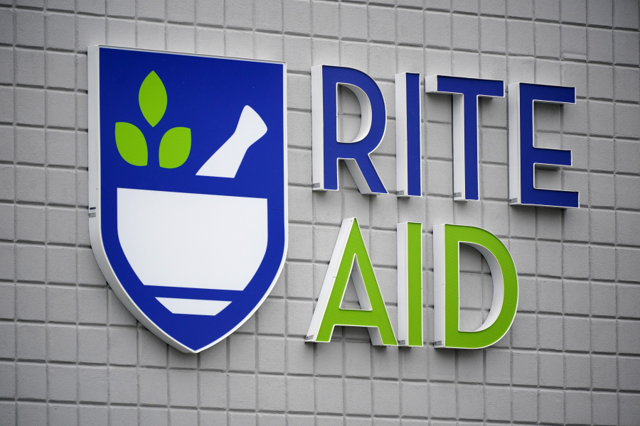 FILE - This photo shows a sign of Rite Aid on its store in Pittsburgh on Jan. 23, 2023. Rite Aid, a major U.S. pharmacy chain, said Sunday, Oct. 15, that it has filed for bankruptcy as part of its effort to restructure its finances. (AP Photo/Gene J.