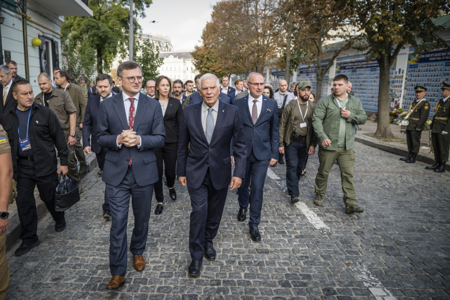 Ukrainian Foreign Minister Dmytro Kuleba, centre left, and European Union Foreign Policy Chief Josep Borrell visit the Memory Wall of Fallen Defenders of Ukraine in Kyiv, Monday, Oct. 2, 2023. Some of Europe's top diplomats have gathered in Kyiv in a display of support for Ukraine's fight against Russia's invasion as signs emerge of political strain in Europe and the United States about the war.