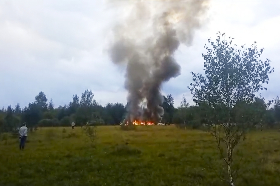 FILE - In this image taken from video, smoke rises from the crash of a private jet near the village of Kuzhenkino in the Tver region of Russia, on Wednesday, Aug. 23, 2023. Mercenary leader Yevgeny Prigozhin, head of the Wagner Group, and his top lieutenants were among the 10 people killed in the crash northwest of the Russian capital.