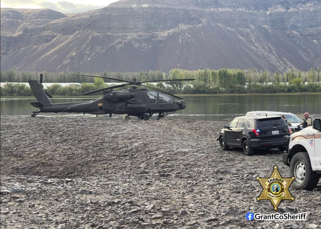 An Army AH-64 Apache helicopter made a hard landing after striking power lines over the Columbia River Friday afternoon, sparking a wildfire and causing state Route 243 south of Vantage, Wash., to close, according to the Grant County Sheriff’s Office. The crew was uninjured, the fire was put out and the highway reopened.