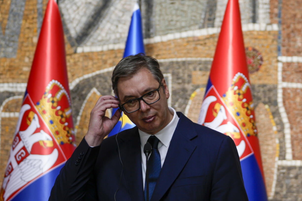 Serbian President Aleksandar Vucic listens to Hungarian Prime Minister Viktor Orban during a press conference after talks at the Serbia Palace in Belgrade, Serbia, Friday, Sept. 29, 2023. Orban is on a one day visit to Serbia.