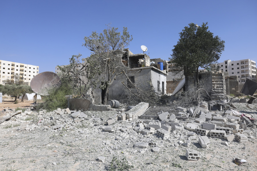 A building destroyed in the shelling from the Syrian government positions is seen in Idlib, Syria, Friday, Oct. 6, 2023.