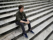 Juan Castelli sits on a staircase at a square in Montevideo, Uruguay, Saturday, July 22, 2023. Castelli was raised in a Catholic household, but has been an atheist since the age of 15. Uruguay, has a long history of secularization that dates to the early 20th century. Today, more than half of its population identify as atheist, agnostic or religiously unaffiliated - the highest portion in Latin America.