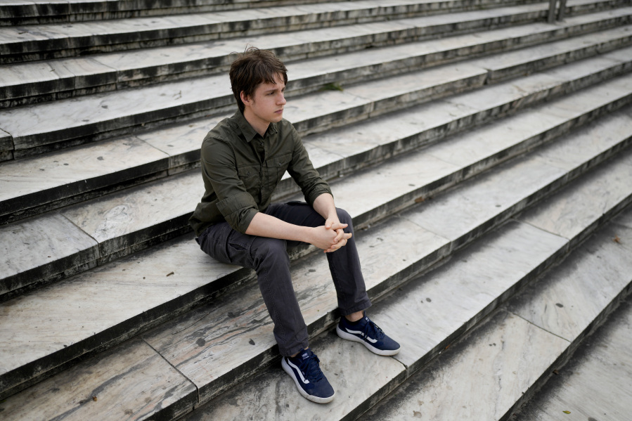 Juan Castelli sits on a staircase at a square in Montevideo, Uruguay, Saturday, July 22, 2023. Castelli was raised in a Catholic household, but has been an atheist since the age of 15. Uruguay, has a long history of secularization that dates to the early 20th century. Today, more than half of its population identify as atheist, agnostic or religiously unaffiliated - the highest portion in Latin America.